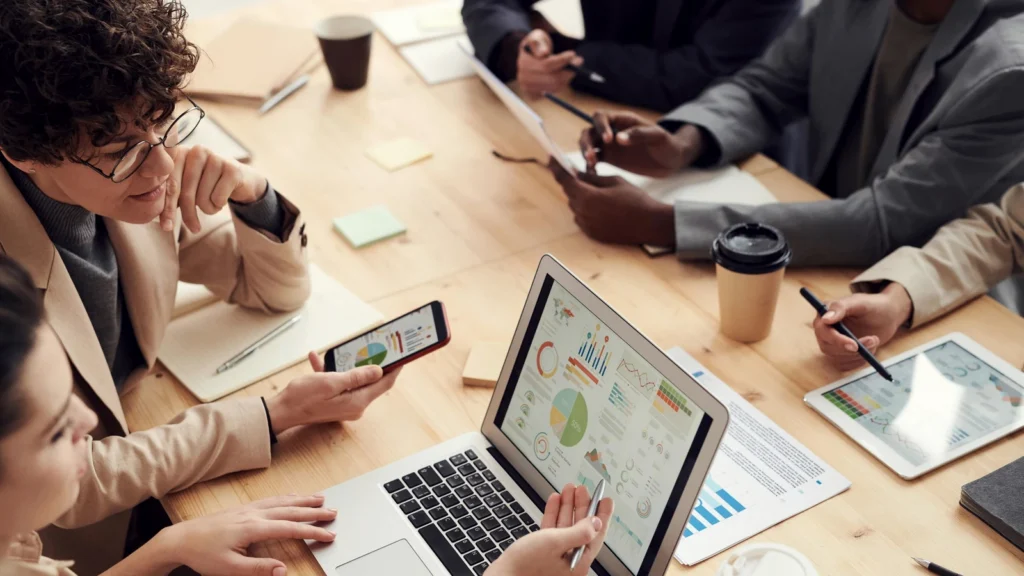 Dubai service business owner reviewing SEO strategy on laptop